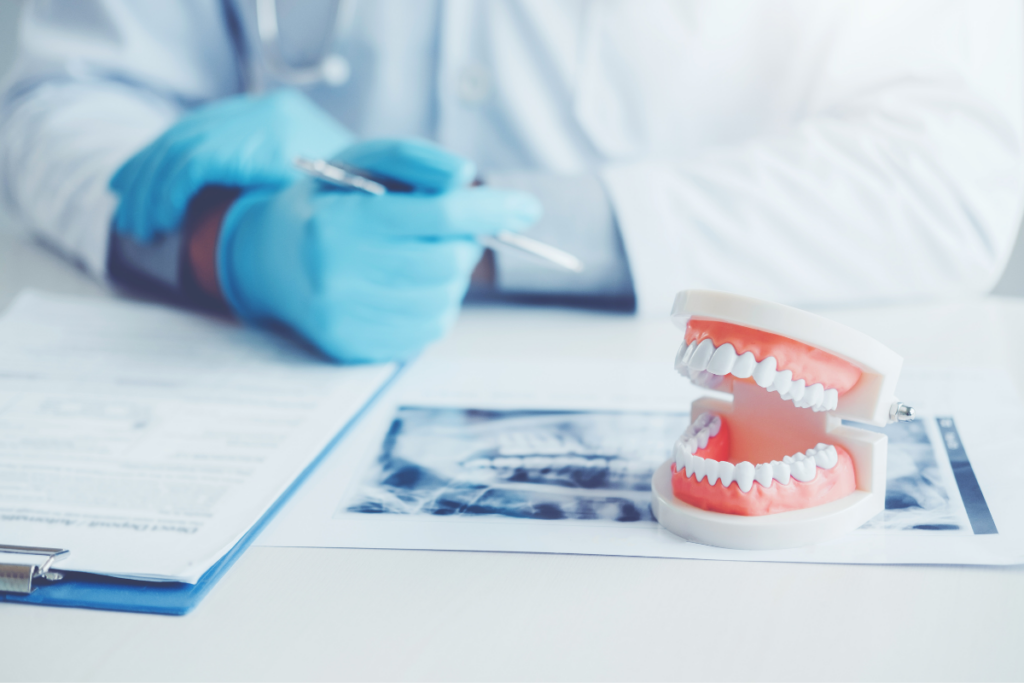 Dentist explaining using dentures