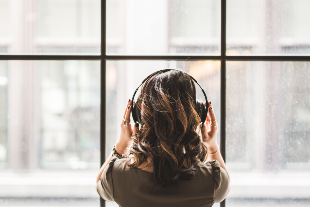 Person relaxing to music