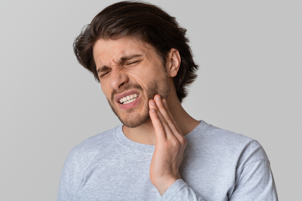 Man with a tooth ache